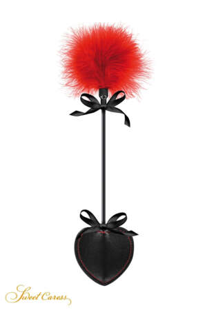 Tapette pique avec pompon rouge